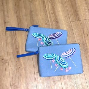 Talbots. It’s a blue bag. Great for accessories, pool/beach days and traveling.